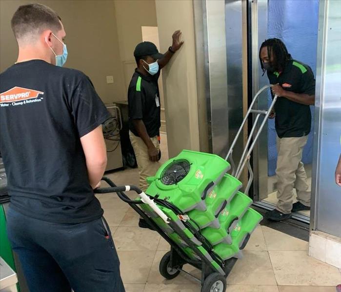 SERVPRO Team unloading air dryers